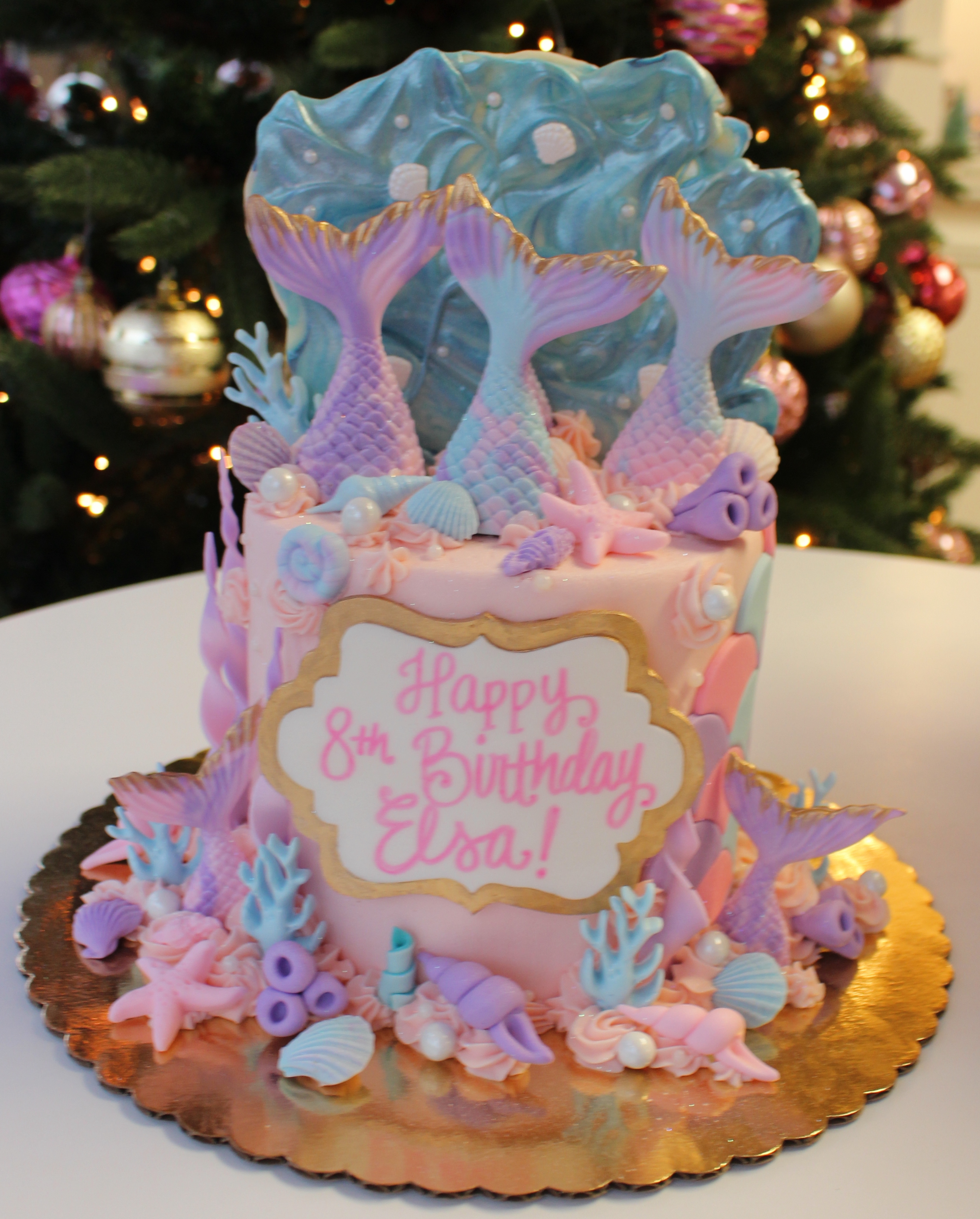 Pink Purple and Teal Mermaid Theme Kids Birthday Cake with Fondant Starfish Seashells and Mermaid Tails