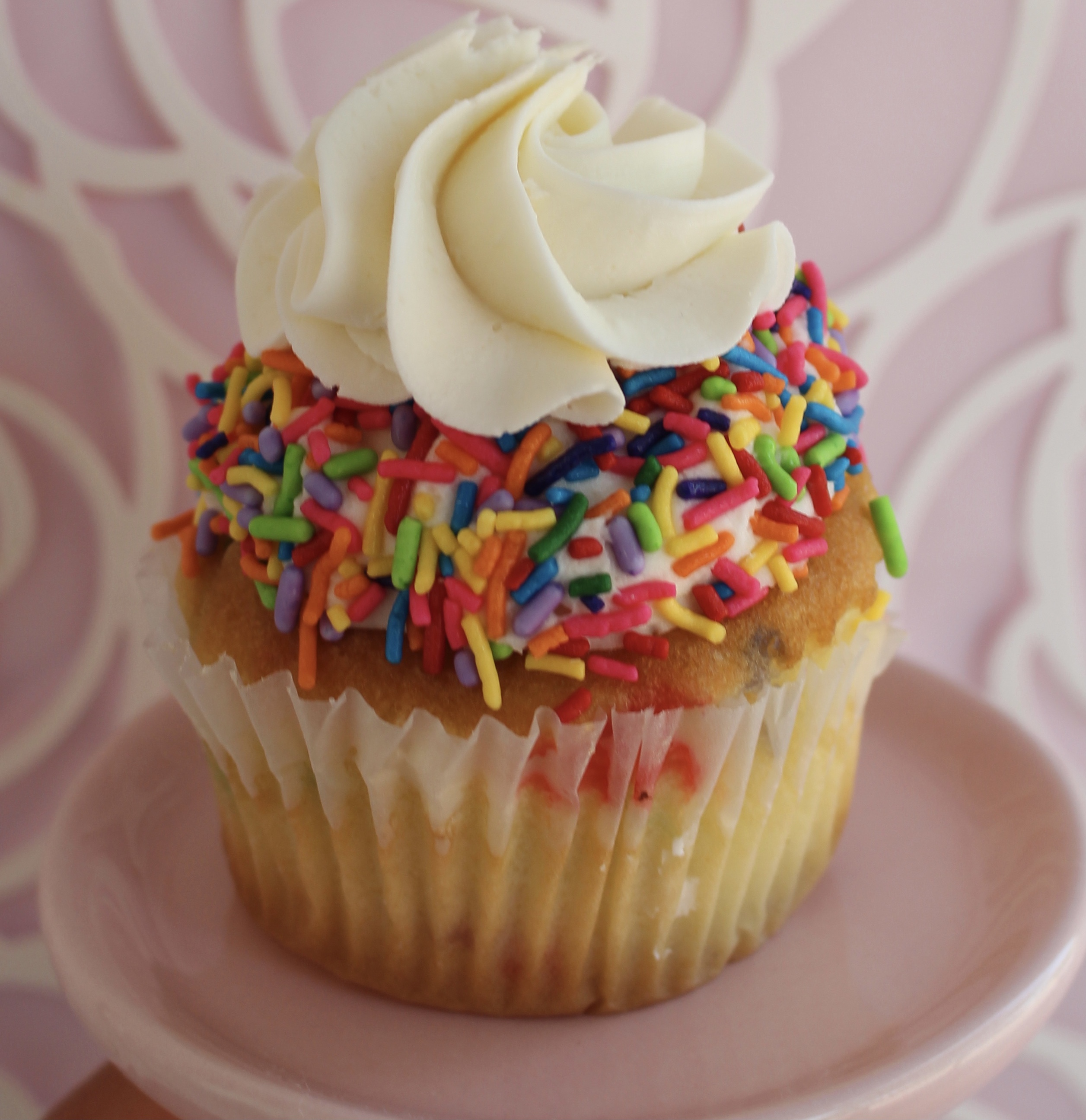 Confetti cake with vanilla buttercream topping and rainbow sprinkles!