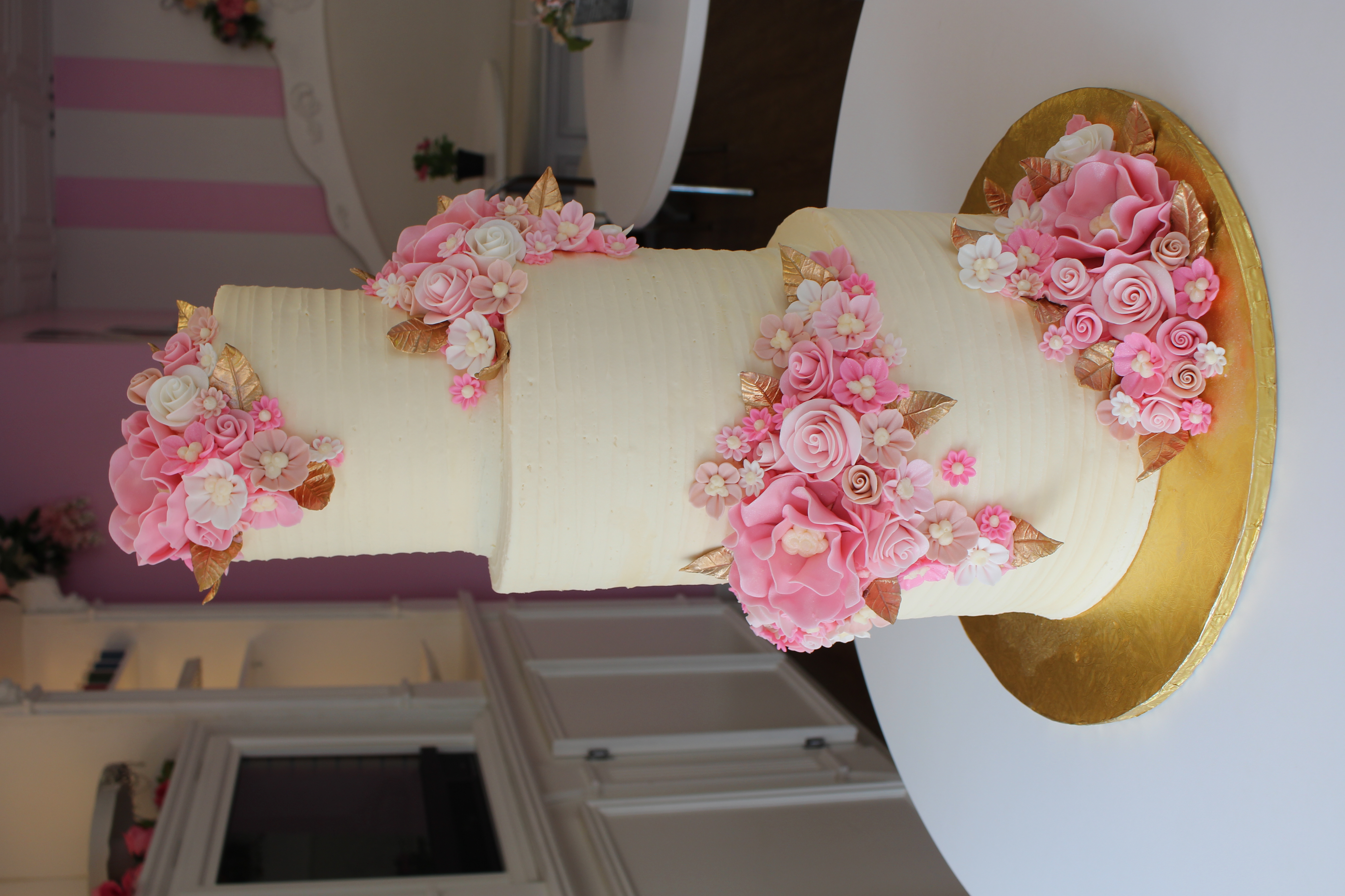 Vanilla Cake on a Gold Board with Buttercream Flowers